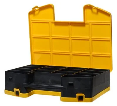 Open yellow black plastic storage organizer with multiple compartments and .. Stock Photos