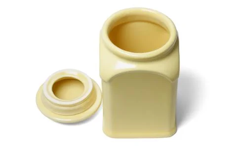 Open yellow ceramic container Stock Photos