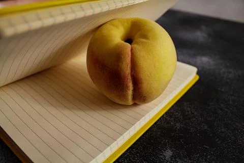 Open yellow notepad on the table, workspase Stock Photos