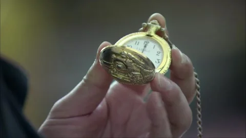 Open your pocket watch to check the time Stock Footage 261639735
