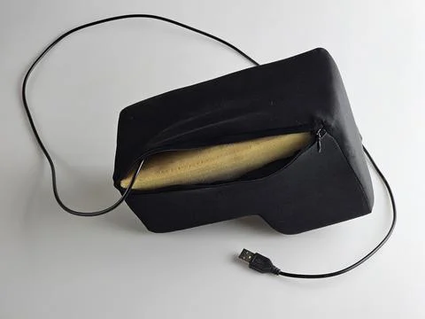 Open Zipper on Oversized USB Enter Key Showing Foam Interior Stock Photos