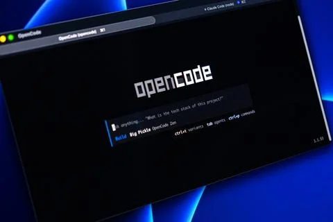 OpenCode software interface displaying a minimalist command input bar on a dark Stock Photos