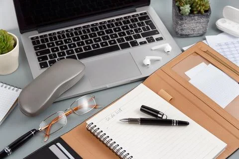 Opened agenda with handwritten TO DO LIST on a grey close up Stock Photos