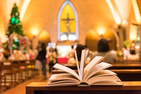 Opened bibble in church with decorations Stock Photos