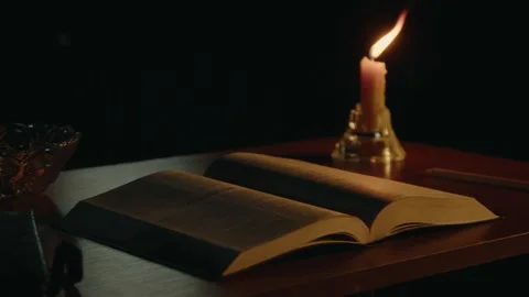 Opened Bible On A Desk Stock Footage 279559992