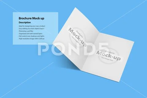 Opened bifold catalog on a blue background Modello PSD