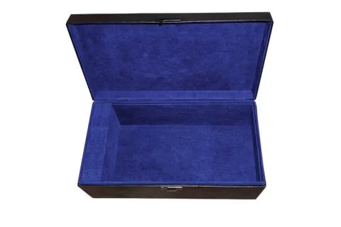 Opened big black box on white isolated background. Blue fabric inside finishi Stock-Fotos