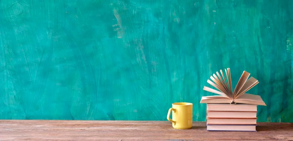 Opened book and stack of book ,reading, education,home office, back to school Stock Photos