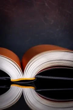 Opened book edges of pages with background Stock Photos