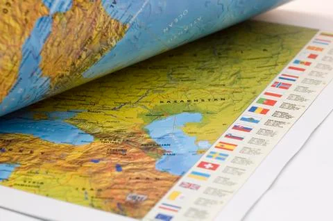 Opened book with map on it Stock Photos