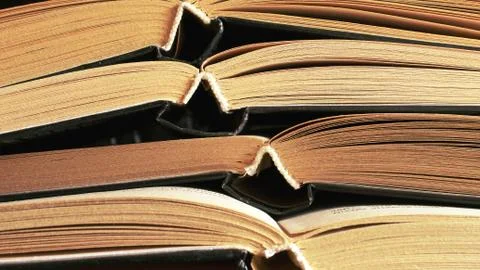 Opened books stack of old books paper reading Stock Photos