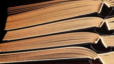 Opened books stack of old books paper Stock Photos