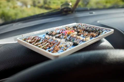 Opened box of specialist flies for fly fishing Stock-Fotos