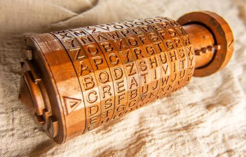 Opened brass cryptex invented by Leonardo da Vinci from the book da vinci code Stock Photos