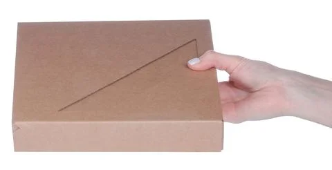 Opened brown box in hand 库存照片