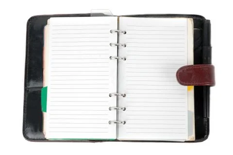 An opened brown leather notebook Stock Photos