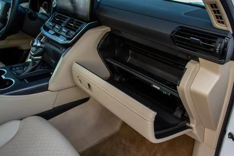 Opened car glove box compartment. Glove compartment of car. Stock Photos