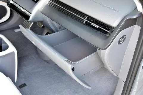 Opened car glove box compartment Stock Photos