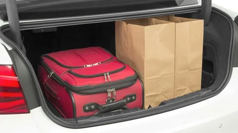 Opened car trunk with luggage Alpine White 2016 BMW 3-series 330e Video stock 159883754