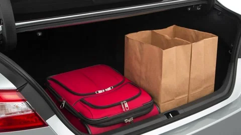 Opened car trunk with luggage Celestial Silver Metallic 2018 Toyota Camry LE Stock Footage 159958388