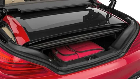Opened car trunk with luggage Mars Red 2017 Mercedes-Benz SL-Class SL450 Stock Footage 159949271
