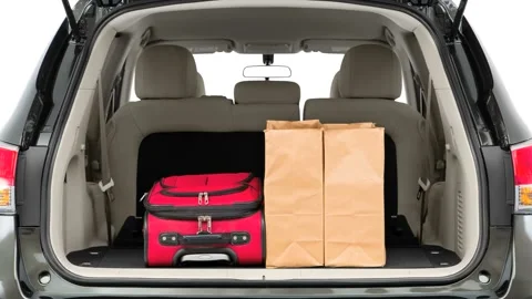 Opened car trunk with luggage Midnight Jade 2016 Nissan Pathfinder S Stock Footage 159867575