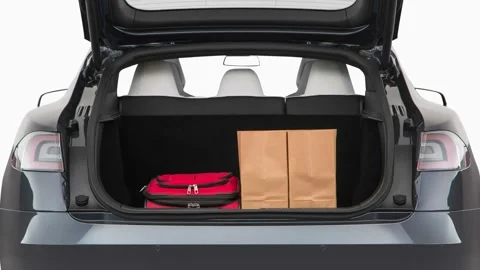 Opened car trunk with luggage Midnight Silver Metallic 2017 Tesla Model S 100D Stock Footage 159970337