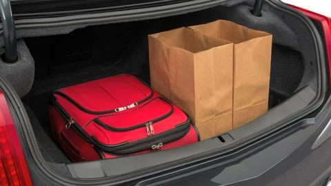 Opened car trunk with luggage Phantom Gray Metallic 2017 Cadillac CTS Luxury Stock Footage 159909781
