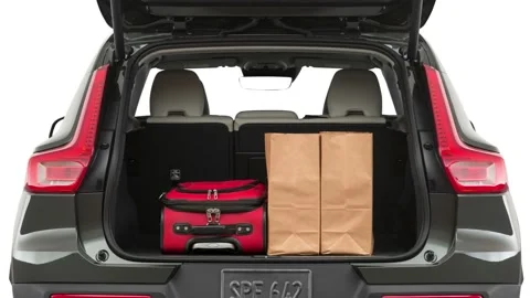 Opened car trunk with luggage Pine Gray Metallic 2019 Volvo XC40 T5 Inscription Stock Footage 160072354