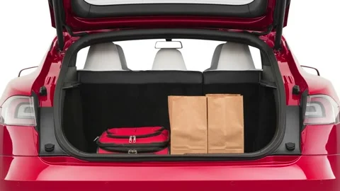 Opened car trunk with luggage Red Multi-Coat 2019 Tesla Model S P100D Stock Footage 160085706