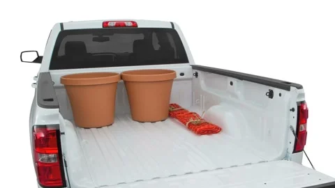 Opened car trunk with luggage Summit White 2016 GMC Sierra 1500 SLE Stock Footage 159859072