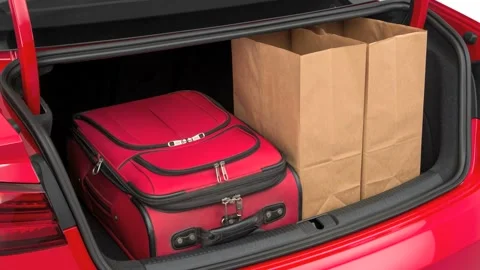 Opened car trunk with luggage Tango Red Metallic 2017 Audi A3 Premium 2.0 TFSI Stock Footage 159922175