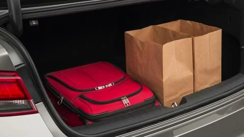 Opened car trunk with luggage Titanium Silver 2019 Kia Optima EX Stock Footage 160025411
