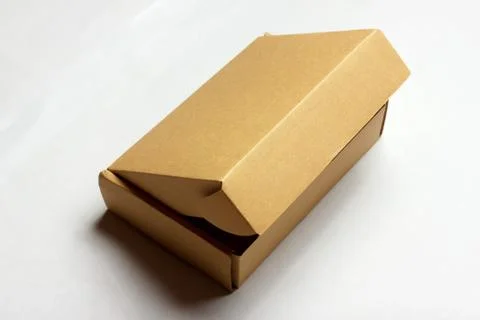 Opened cardboard box isolated on a white Fotos de archivo