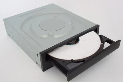 Opened CD - DVD drive with a black cap and disk inside. Stock Photos