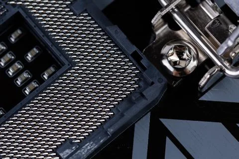 Opened central processor LGA slot on pc mainboard - closeup shot with selective Stock Photos