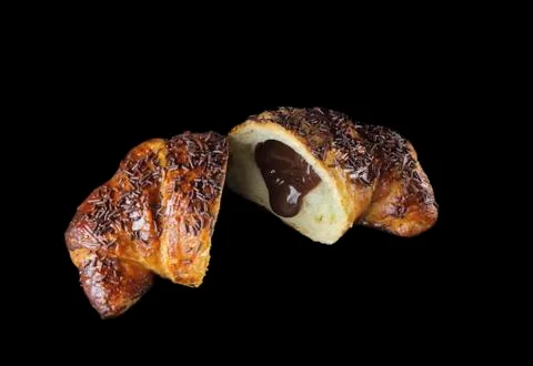 Opened chocolate croissant Stock Photos