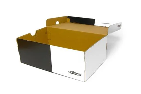 Opened empty Adidas box. Blank and white shoes box on a white background. San Stock Photos