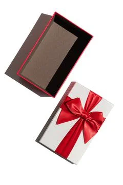 Opened empty gift box and lid with red ribbon isolated on white Stock Photos
