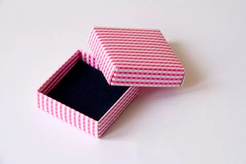 Opened empty pink paper giftbox Stock Photos