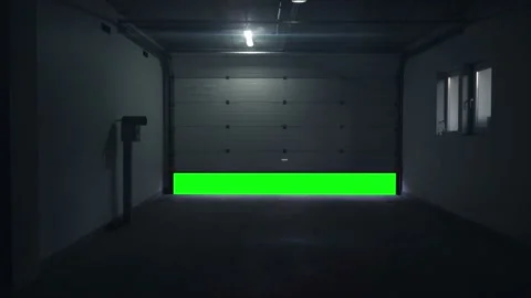 Opened Garage Roller Door with Green Screen or Chroma Key background Stock Footage 191102593