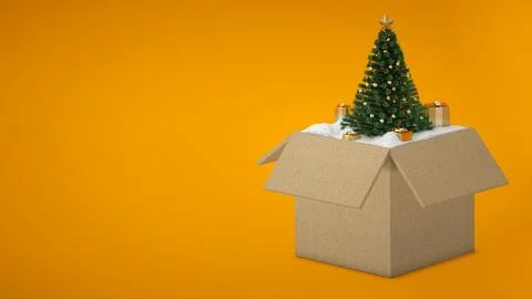Opened gift box full of a Christmas Tree and Snow, Christmas Tree inside a .. Stock Photos