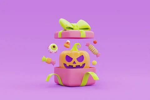 Opened gift boxes with Halloween Jack-o-Lantern pumpkins and colorful candies Stock Photos