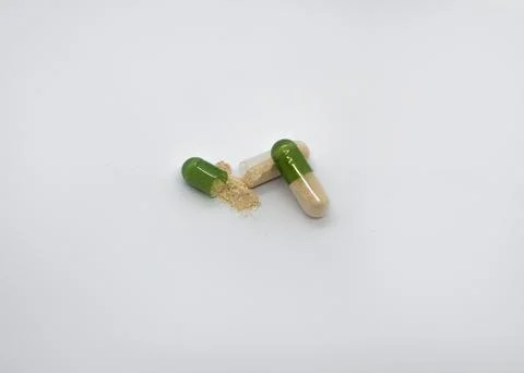 Opened green tablet on a white background. Foto stock