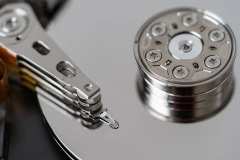 Opened hard disk after disassembly during repair or service, macro shot Stock-Fotos