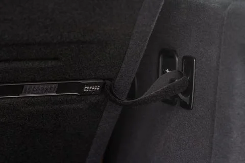 Opened hook for packages in the trunk of the car. Modern car trunk. Foto stock