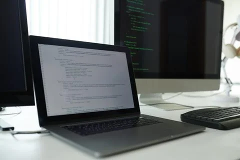 Opened Laptop with Programming Code 스톡 사진