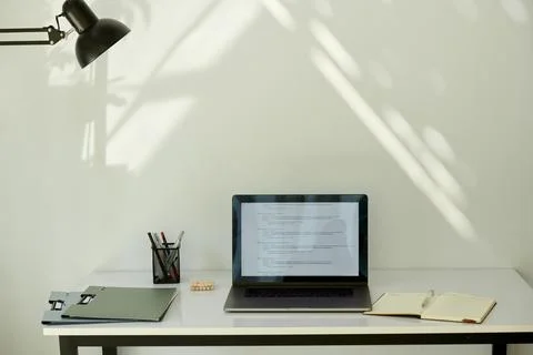 Opened Laptop with Programming Code 写真素材