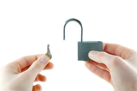 Opened lock and key in hand Stock Photos