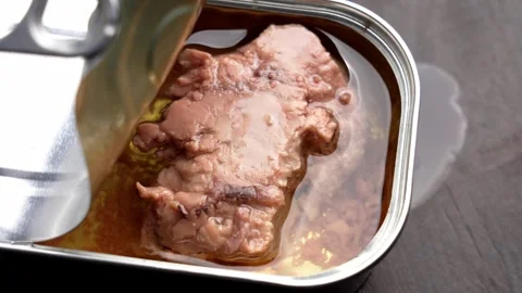 Opened metal can filled with cod liver 動画素材 335686495